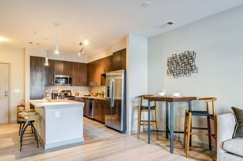 Beautiful kitchen with stainless appliances and island at Indigo 301 Apartments, King of Prussia, 19406